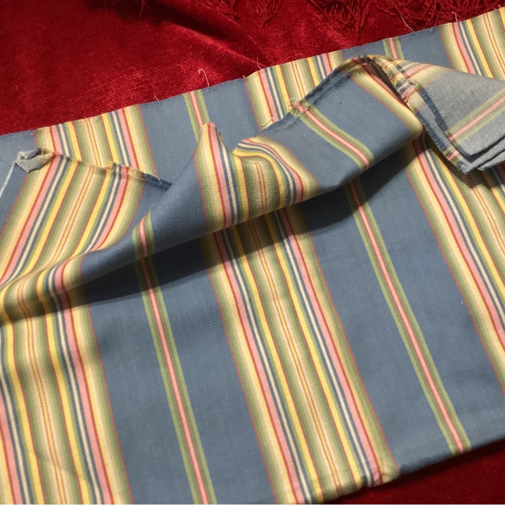 Striped fabric 3 panels 19” by 24” , 1 panel 19” by 23”, 2 strips 3 1/2” by 25”